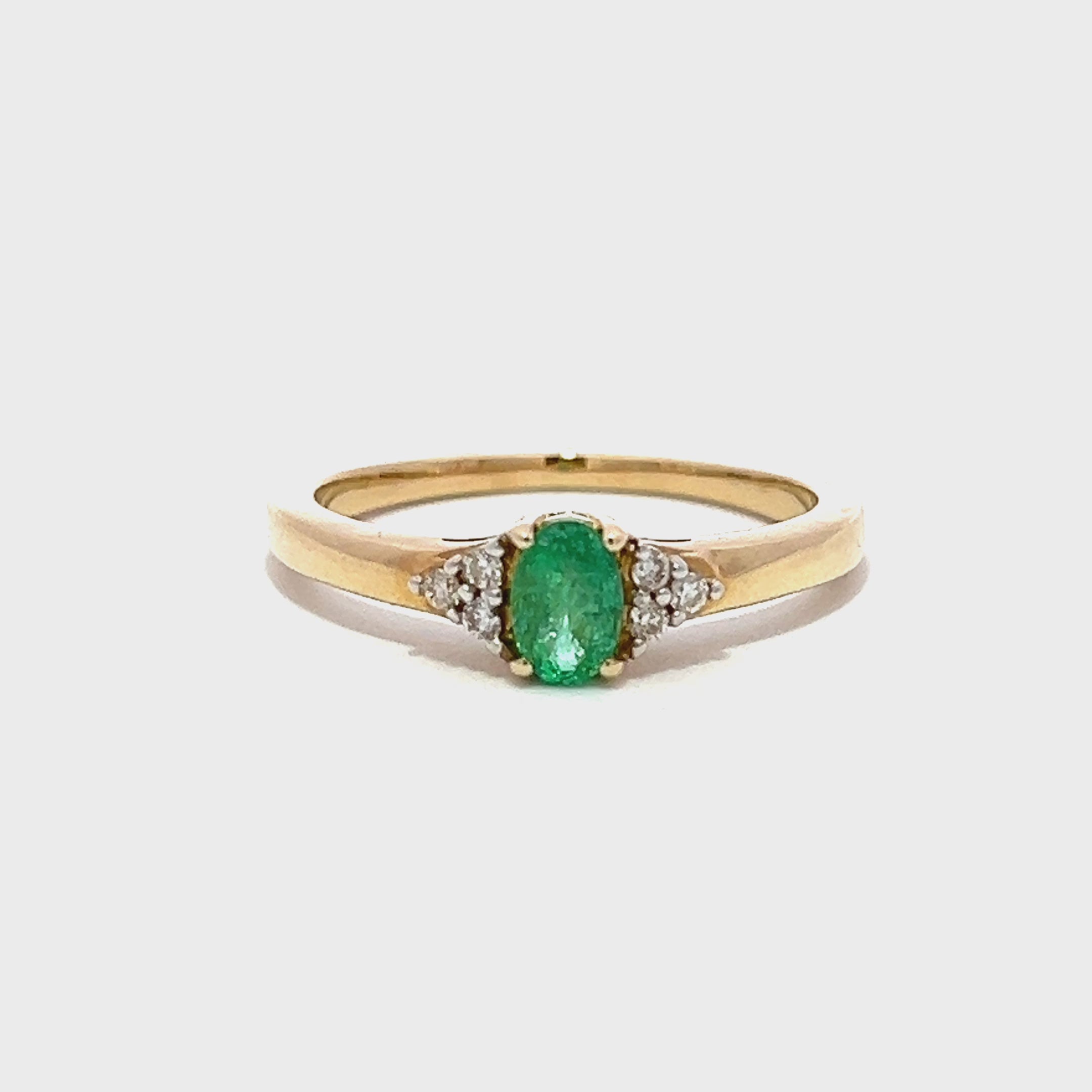 Oval Emerald Diamond Ring
