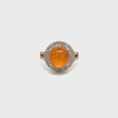Golden Cabochon Sapphire and Diamond Halo Ring