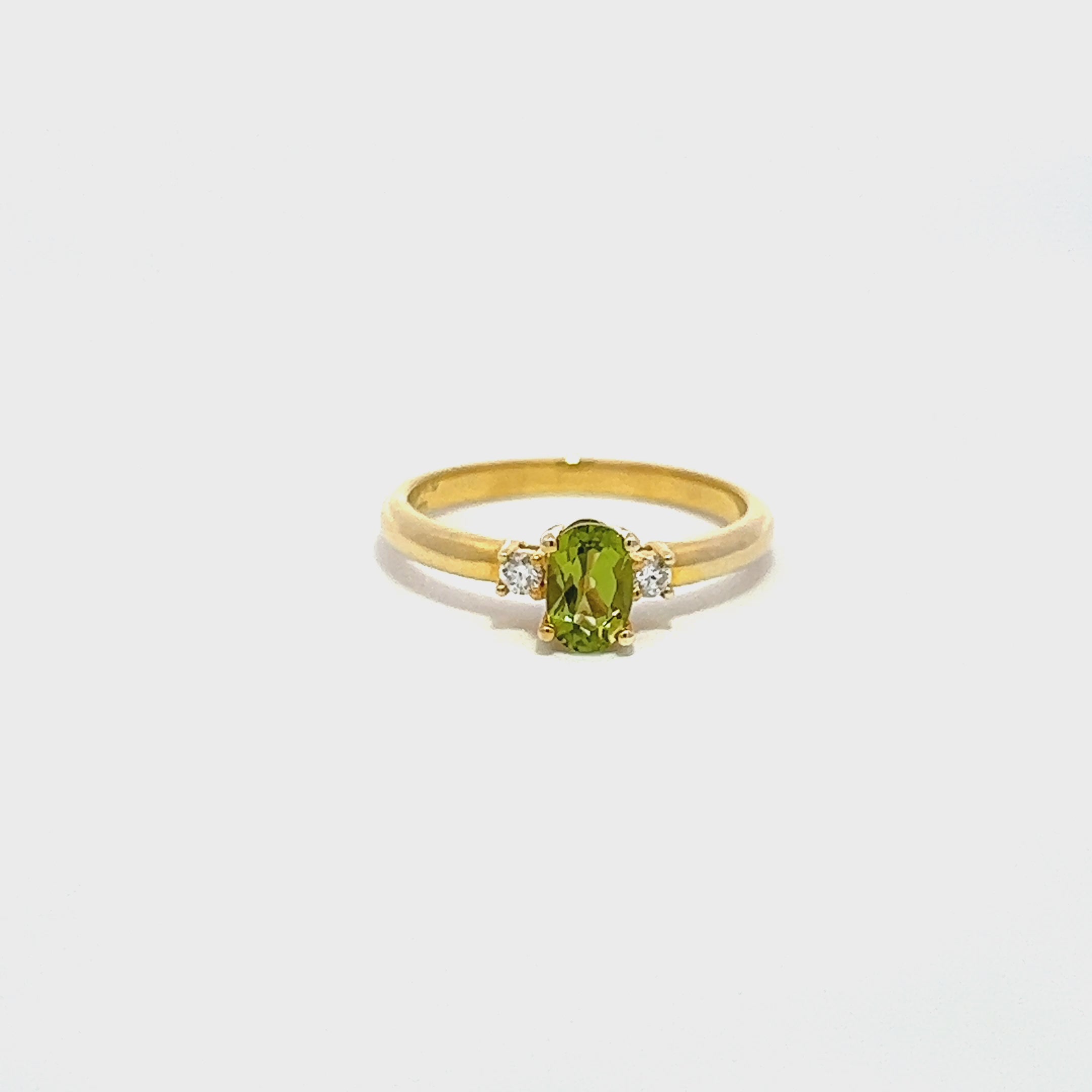 Peridot Oval and Diamond Ring
